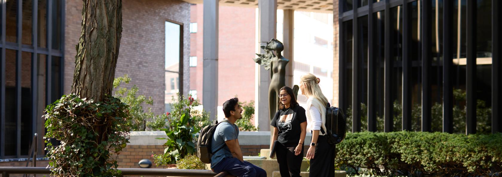 Medical Humanities students walk through the courtyard